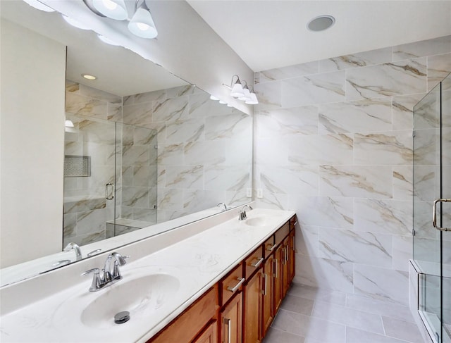 6407 Capulet Pl, Dallas, TX 75252 - full bathroom with double vanity, a stall shower, tile walls, and recessed lighting