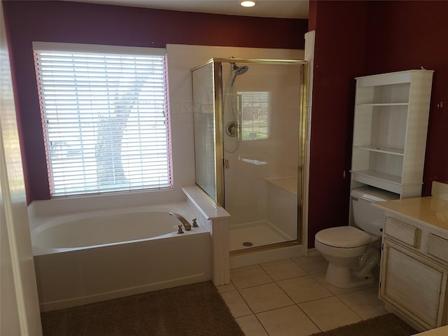 full bathroom with tile patterned floors, a bath, vanity, and a shower stall