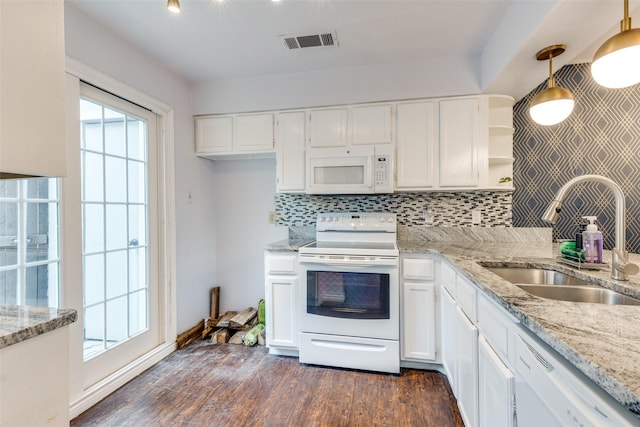 2330 Kennington Dr Unit D, Arlington, TX 76012 - kitchen with white appliances, a sink, open shelves, white cabinets, and tasteful backsplash