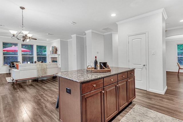 1600 Templegate Dr, Mckinney, TX 75072 - kitchen featuring ornamental molding, wood finished floors, baseboards, a chandelier, and recessed lighting