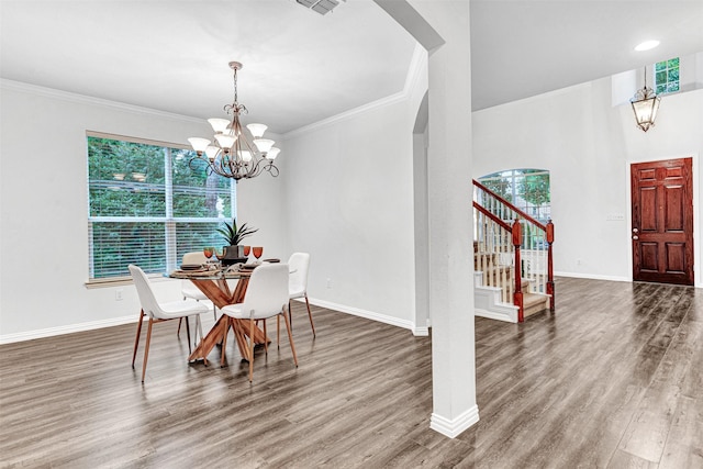 1600 Templegate Dr, Mckinney, TX 75072 - dining space with plenty of natural light, a chandelier, stairway, baseboards, and crown molding
