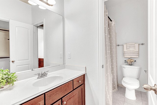 1600 Templegate Dr, Mckinney, TX 75072 - full bathroom featuring vanity, toilet, and tile patterned floors