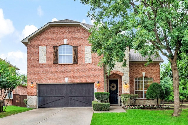 1600 Templegate Dr, Mckinney, TX 75072 - traditional home featuring an attached garage, driveway, brick siding, and a shingled roof