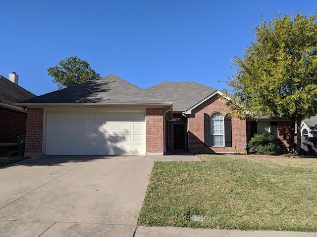 803 W Lonesome Dove Trl, Arlington, TX 76001 - single story home featuring brick siding, driveway, an attached garage, and a front lawn