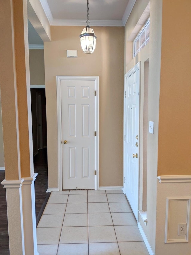 803 W Lonesome Dove Trl, Arlington, TX 76001 - entryway with light tile patterned flooring, ornamental molding, and baseboards