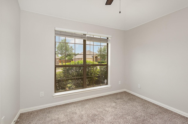 213 Longhorn Dr, Waxahachie, TX 75165 - spare room featuring carpet floors, baseboards, and a ceiling fan