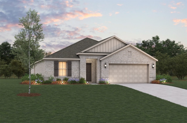 1903 Dove Dr, Princeton, TX 75407 - view of front of property with board and batten siding, brick siding, a garage, a lawn, and concrete driveway