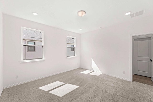 1126 Bexar Ln, Plano, TX 75075 - spare room featuring carpet floors, baseboards, and recessed lighting