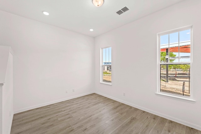 1126 Bexar Ln, Plano, TX 75075 - unfurnished room with light wood finished floors, baseboards, and recessed lighting