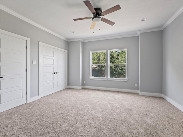 6223 Post Oak Ter, Fort Worth, TX 76112 - unfurnished bedroom with ornamental molding, carpet flooring, baseboards, a ceiling fan, and a closet