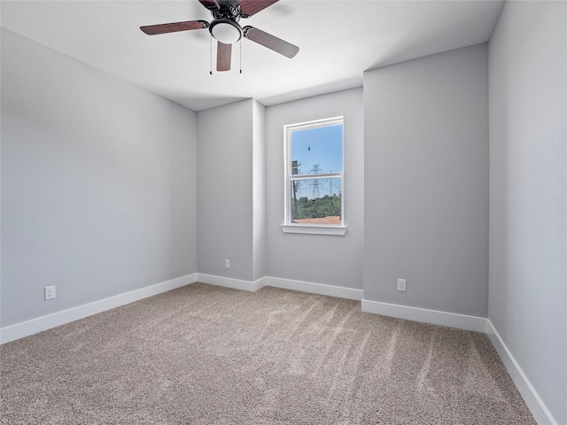 6223 Post Oak Ter, Fort Worth, TX 76112 - empty room with light carpet, a ceiling fan, and baseboards