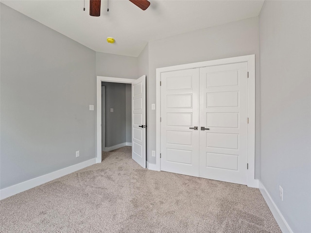 6223 Post Oak Ter, Fort Worth, TX 76112 - unfurnished bedroom featuring carpet floors, a closet, baseboards, and a ceiling fan