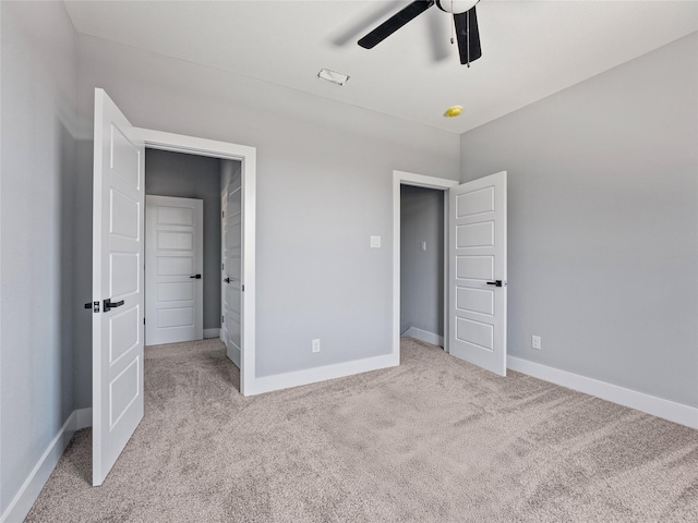 6223 Post Oak Ter, Fort Worth, TX 76112 - unfurnished bedroom featuring light carpet, baseboards, and ceiling fan