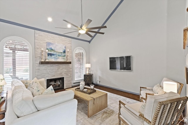 755 Richmond Ln, Keller, TX 76248 - living area featuring a ceiling fan, wood finished floors, a large fireplace, and high vaulted ceiling