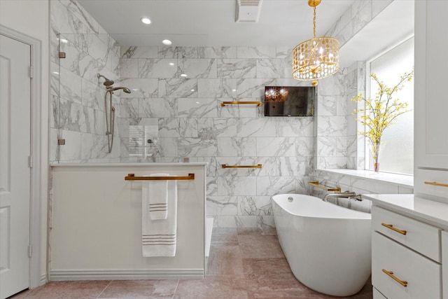 755 Richmond Ln, Keller, TX 76248 - bathroom with walk in shower, plenty of natural light, a freestanding tub, a chandelier, and recessed lighting