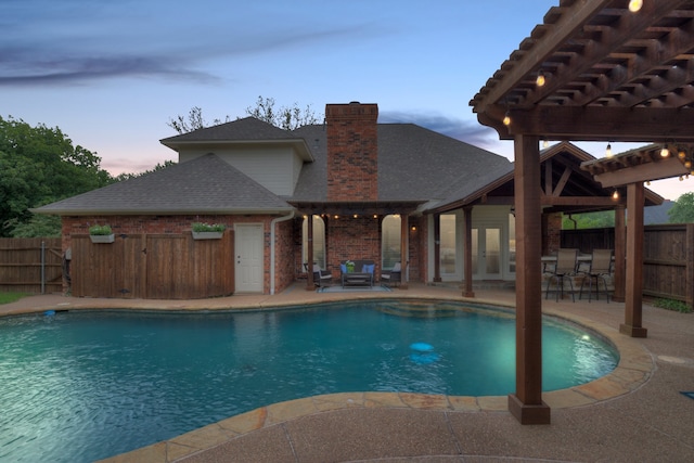 755 Richmond Ln, Keller, TX 76248 - pool at dusk with a pergola, fence, and a patio