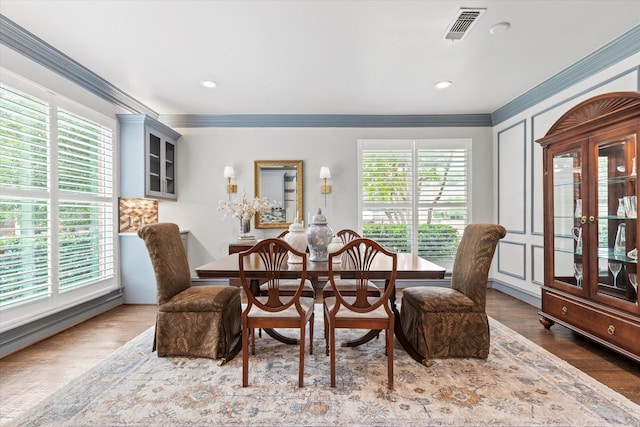 755 Richmond Ln, Keller, TX 76248 - dining area with crown molding, wood finished floors, and recessed lighting