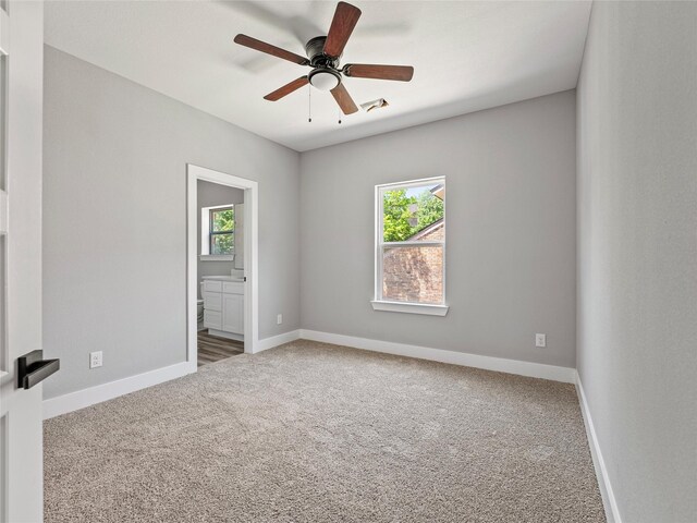 6221 Post Oak Ter, Fort Worth, TX 76112 - unfurnished room with carpet floors, ceiling fan, and baseboards