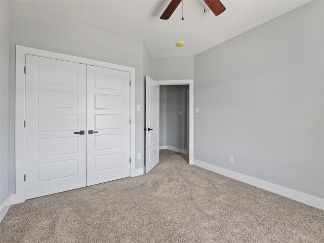 6221 Post Oak Ter, Fort Worth, TX 76112 - unfurnished bedroom featuring light colored carpet, baseboards, a closet, and ceiling fan
