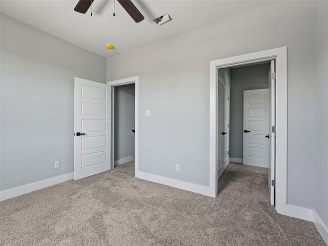 6221 Post Oak Ter, Fort Worth, TX 76112 - unfurnished bedroom with carpet flooring, baseboards, and a ceiling fan