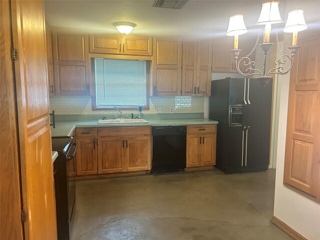 3415 Reily Ln, Shreveport, LA 71105 - kitchen featuring black appliances, a sink, light countertops, and tasteful backsplash
