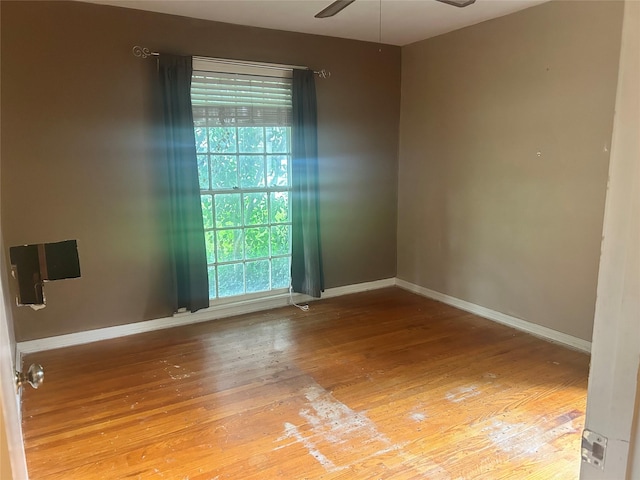 3415 Reily Ln, Shreveport, LA 71105 - unfurnished room featuring hardwood / wood-style flooring, baseboards, and ceiling fan
