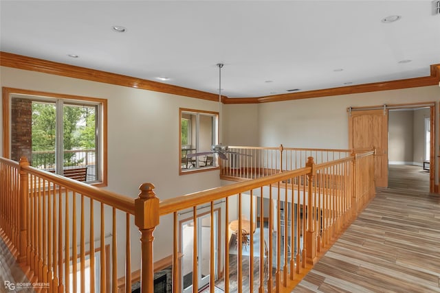 135 Oak Leaf Trl, Benton, LA 71006 - hallway with crown molding, light wood-style flooring, recessed lighting, an upstairs landing, and baseboards