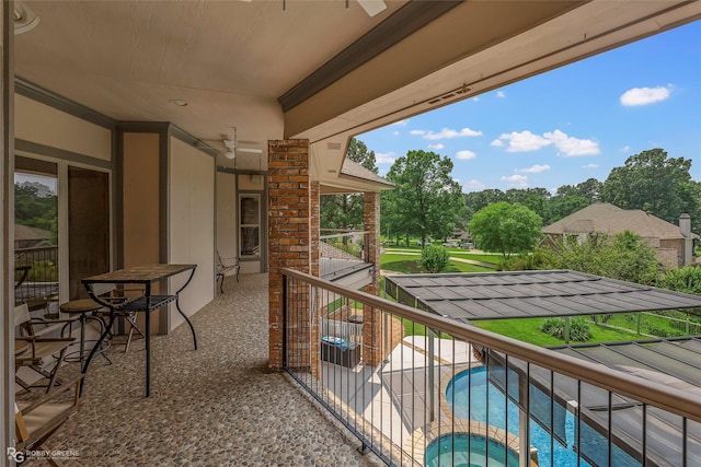 135 Oak Leaf Trl, Benton, LA 71006 - balcony with view of pool area and a ceiling fan