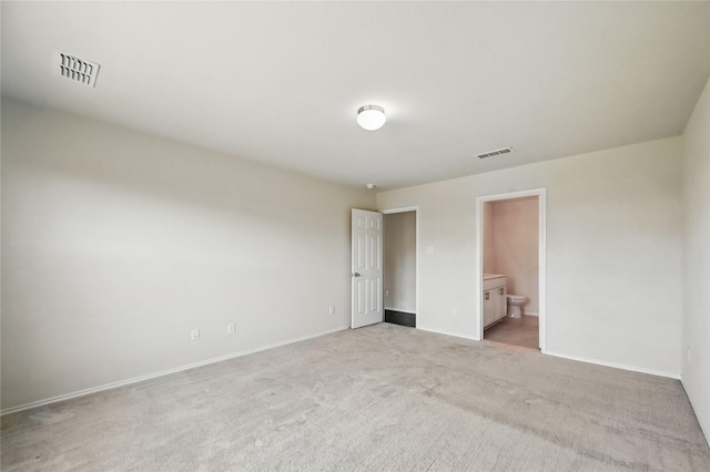 1611 Timpson Dr, Forney, TX 75126 - unfurnished bedroom featuring light carpet, baseboards, and ensuite bathroom