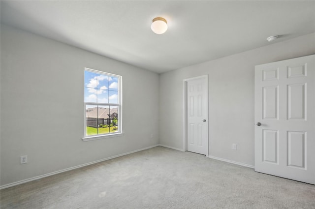1611 Timpson Dr, Forney, TX 75126 - unfurnished bedroom featuring carpet floors and baseboards