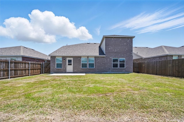 1611 Timpson Dr, Forney, TX 75126 - rear view of property featuring a patio, brick siding, and roof with shingles