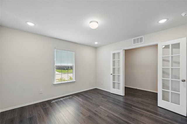 1611 Timpson Dr, Forney, TX 75126 - empty room with french doors, dark wood-style flooring, baseboards, recessed lighting, and a smoke detector