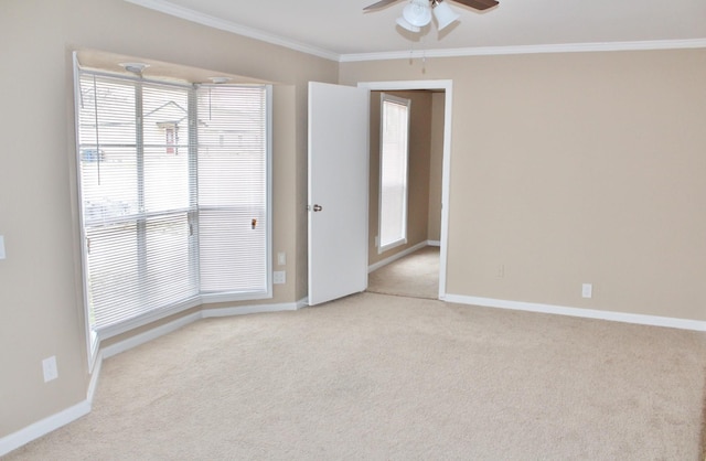 302 N 1st St, Wylie, TX 75098 - empty room with crown molding, ceiling fan, light carpet, and baseboards