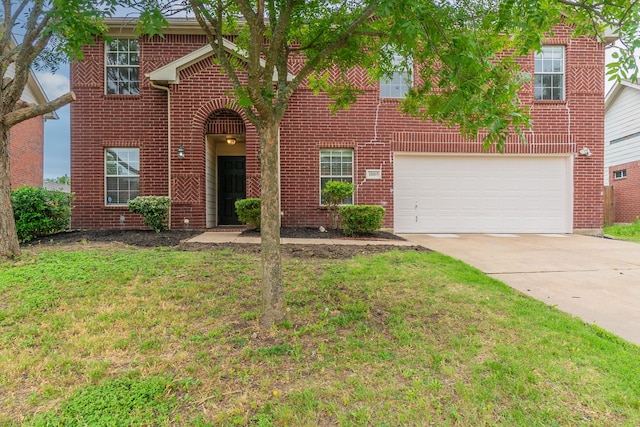 1005 Bainbridge Ln, Forney, TX 75126 - traditional home featuring driveway, a garage, brick siding, and a front yard