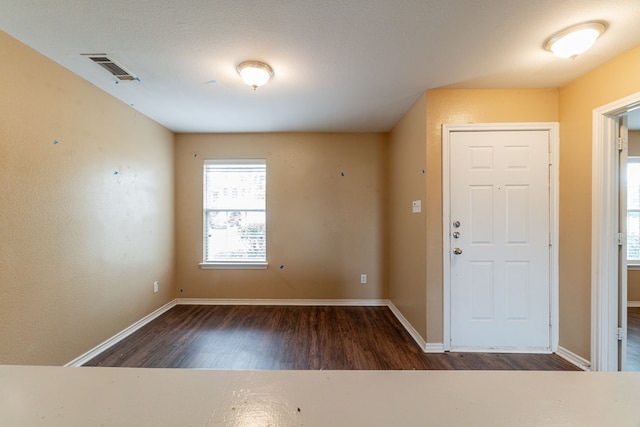 1005 Bainbridge Ln, Forney, TX 75126 - entryway featuring wood finished floors and baseboards