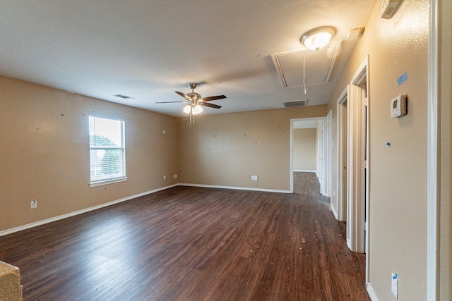 1005 Bainbridge Ln, Forney, TX 75126 - unfurnished room with attic access, dark wood-style flooring, baseboards, and a ceiling fan