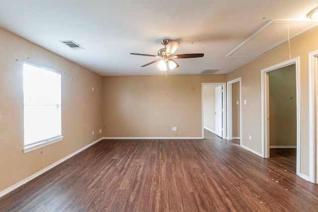 1005 Bainbridge Ln, Forney, TX 75126 - empty room featuring attic access, wood finished floors, a ceiling fan, and baseboards