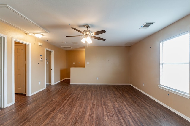 1005 Bainbridge Ln, Forney, TX 75126 - spare room with attic access, wood finished floors, a ceiling fan, and baseboards