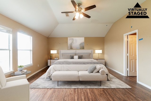 1005 Bainbridge Ln, Forney, TX 75126 - bedroom with wood finished floors, lofted ceiling, baseboards, and a ceiling fan