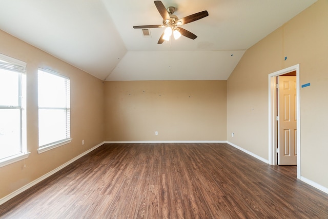 1005 Bainbridge Ln, Forney, TX 75126 - empty room with wood finished floors, vaulted ceiling, a ceiling fan, and baseboards