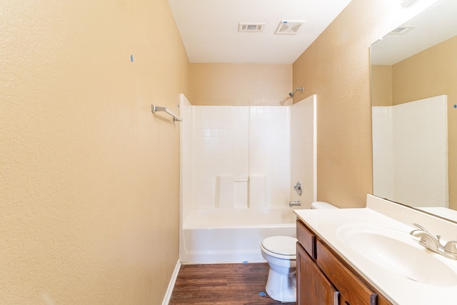 1005 Bainbridge Ln, Forney, TX 75126 - full bathroom featuring toilet, wood finished floors, vanity, shower / washtub combination, and baseboards