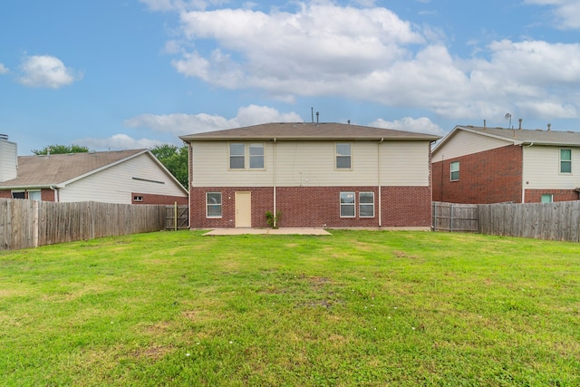 1005 Bainbridge Ln, Forney, TX 75126 - back of property featuring a patio and brick siding