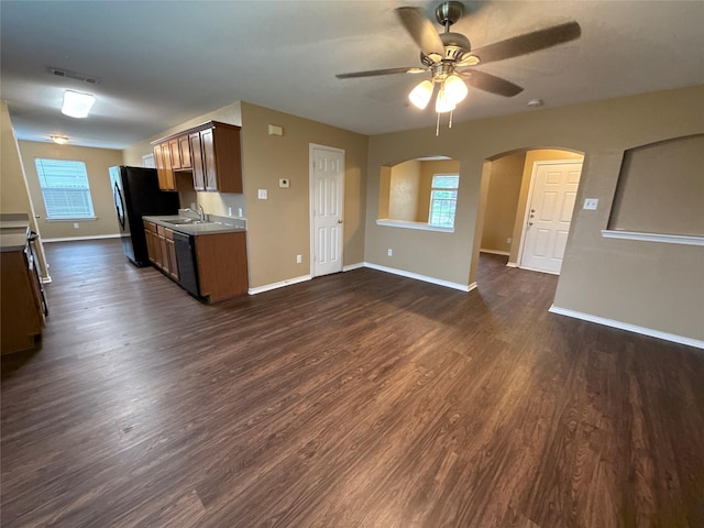 1005 Bainbridge Ln, Forney, TX 75126 - kitchen featuring black appliances, ceiling fan, a sink, dark wood finished floors, and baseboards