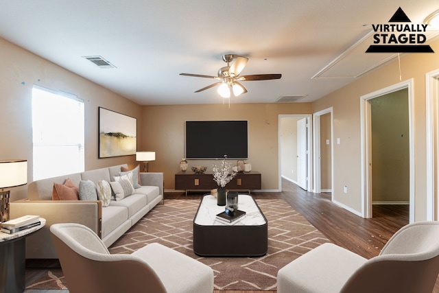 1005 Bainbridge Ln, Forney, TX 75126 - living area featuring wood finished floors, ceiling fan, attic access, and baseboards