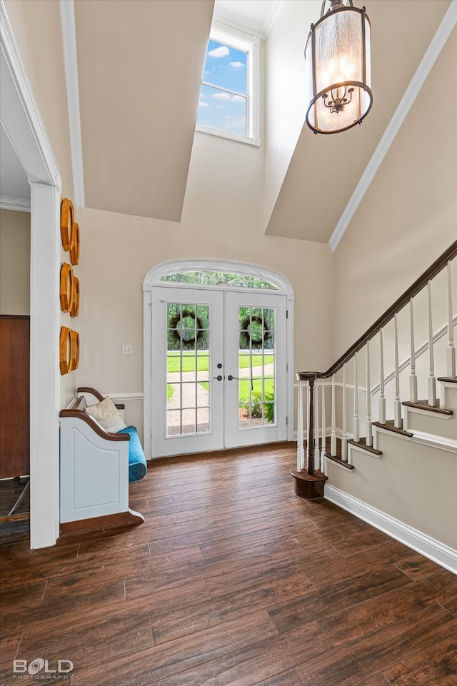 10198 Castanedo Ct, Keithville, LA 71047 - foyer with a towering ceiling, healthy amount of natural light, french doors, stairway, and wood finished floors