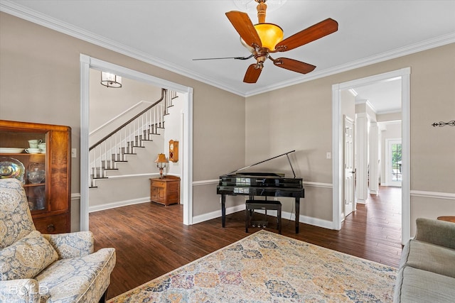 10198 Castanedo Ct, Keithville, LA 71047 - living area with wood finished floors, stairs, ornamental molding, a ceiling fan, and baseboards