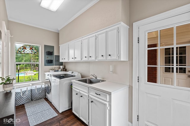 10198 Castanedo Ct, Keithville, LA 71047 - washroom featuring cabinet space, separate washer and dryer, dark wood-type flooring, and ornamental molding