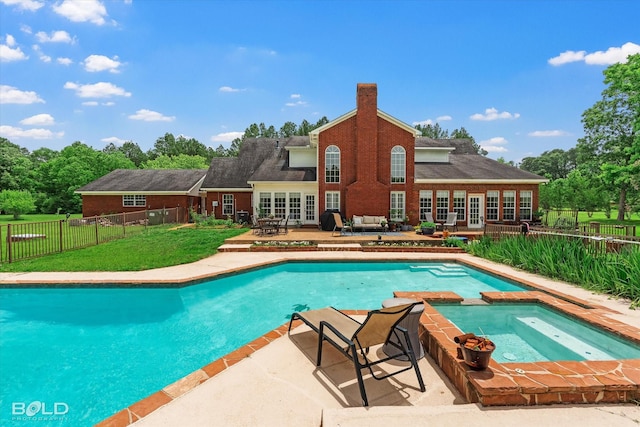 10198 Castanedo Ct, Keithville, LA 71047 - view of swimming pool featuring french doors, a patio, a pool with connected hot tub, and outdoor lounge area
