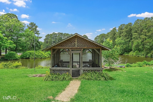 10198 Castanedo Ct, Keithville, LA 71047 - view of front facade with a sunroom, a front yard, and a water view