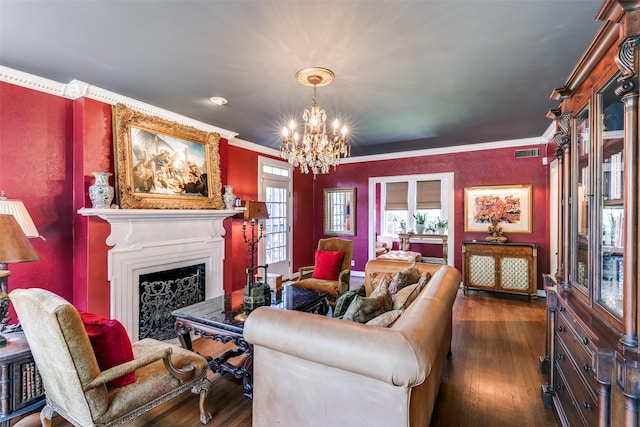4317 Rawlins St, Dallas, TX 75219 - living room with wood finished floors, a chandelier, crown molding, and a fireplace